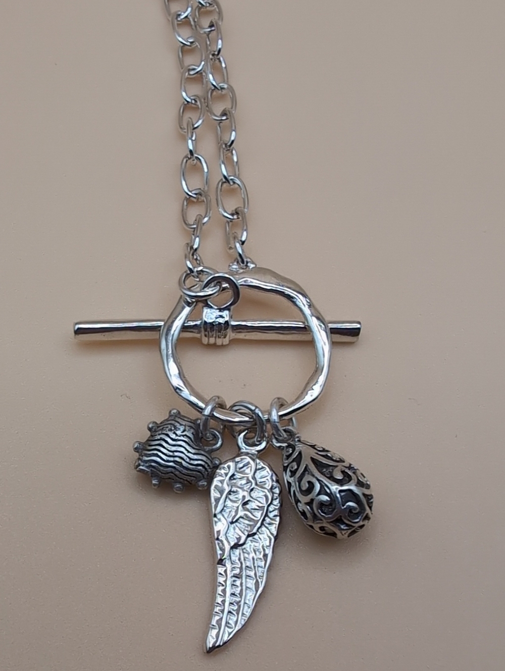 Calvin Klein Silver Toggle Necklace with Wing, Heart & Textured Charms NEW!